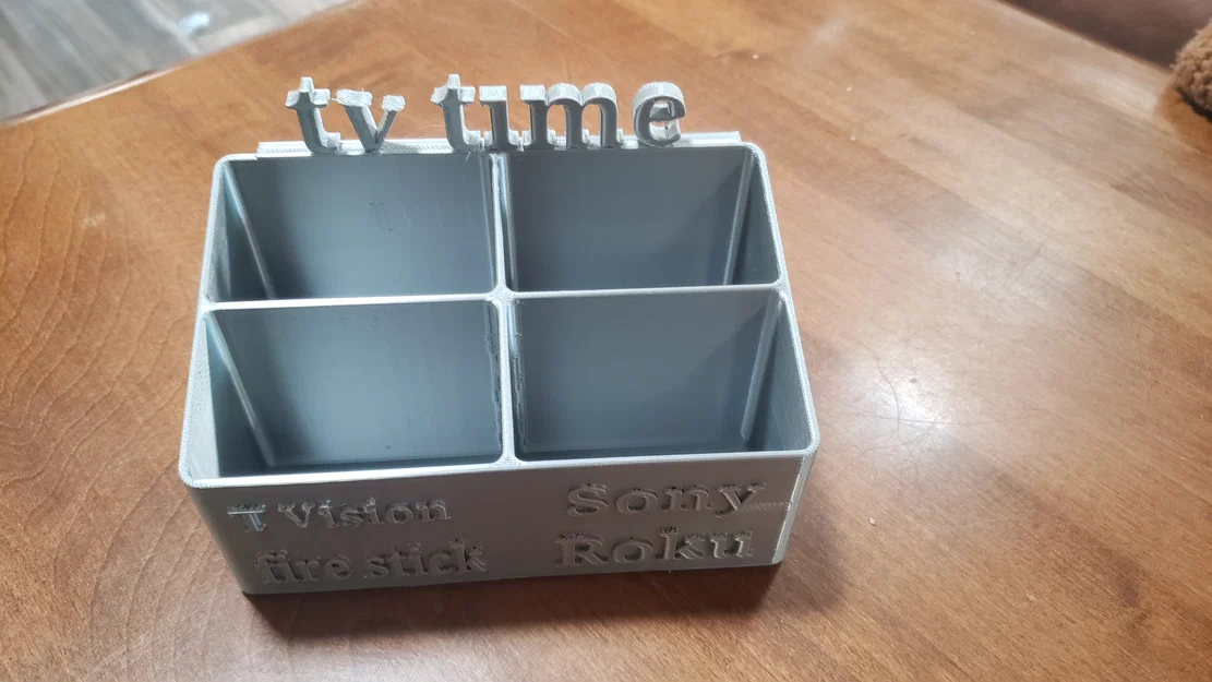 Khay để điều khiển TV (TV Remote Holder) tiện ích - In 3D dễ dàng - Image 1