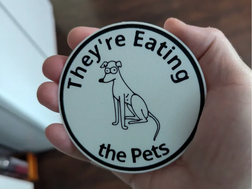 Lót ly “They're Eating the Pets Coaster” - Image 1
