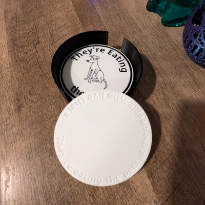 Lót ly “They're Eating the Pets Coaster”