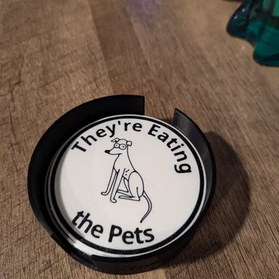 Lót ly “They're Eating the Pets Coaster”
