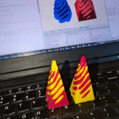 Đồ chơi fidget twisty puzzle kim tự tháp parametric pass-through (OpenSCAD)