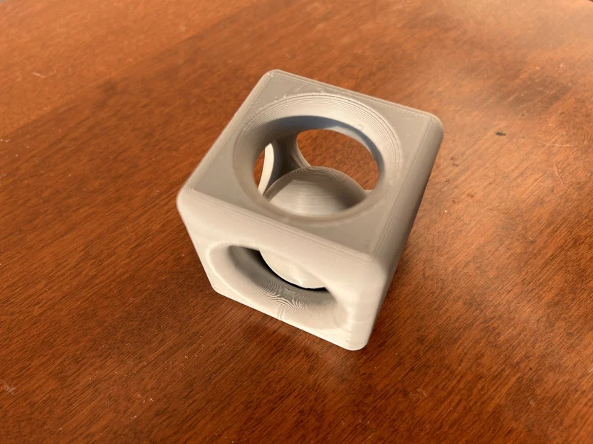Mô hình đồ chơi khối lập phương chứa quả cầu (Ball Stuck in Cube) - Image 2