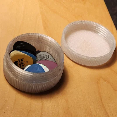 Hộp đựng pick guitar ren vặn có “wheezer lick”