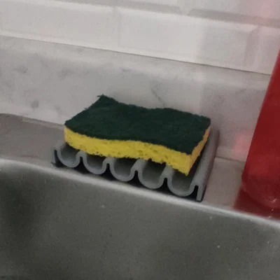 Giá để xà phòng hoặc miếng rửa chén