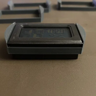 Ngàm gắn đồng hồ đo độ ẩm cho hộp Drybox