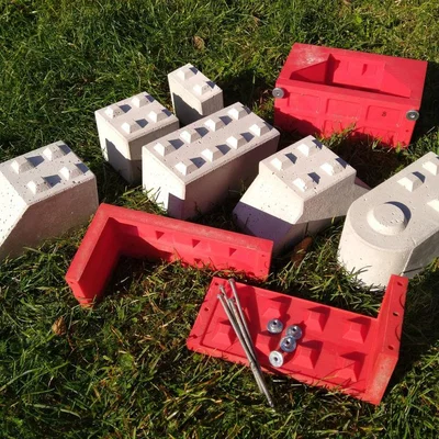 Khuôn đúc block bê tông khóa liên kết tỉ lệ (scale interlocking concrete block form)