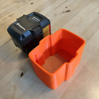 Giá đỡ pin Husqvarna BLi (Holder for Husqvarna BLi battery)