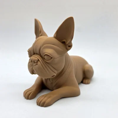Mô hình chú chó Boston Terrier đang nằm