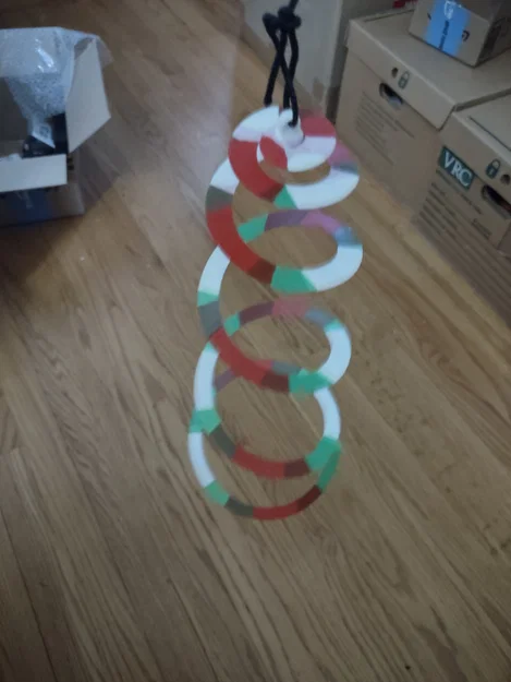 Wind Spinner – Con Rắn Xoắn Ốc Quay Trong Gió - Image 1