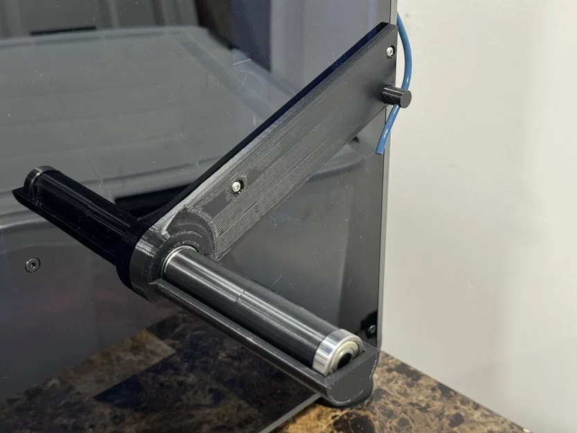 Creality K1/K1C: Con lăn treo cuộn gắn hông + peg Bowden xoay - Image 1