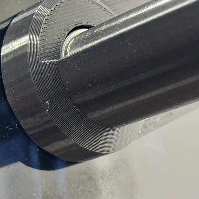 Creality K1/K1C: Con lăn treo cuộn gắn hông + peg Bowden xoay