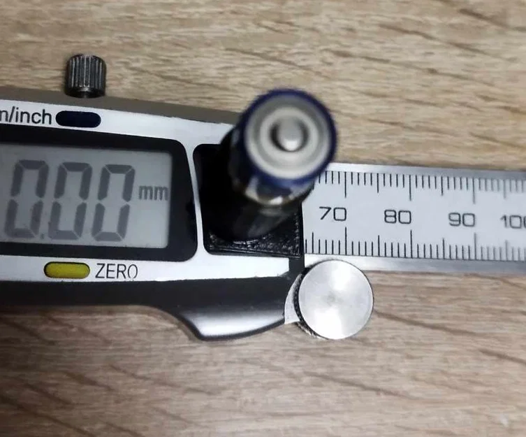 Phụ kiện kẹp thước đo Magnusson giữ pin AAA in 3D - Image 1