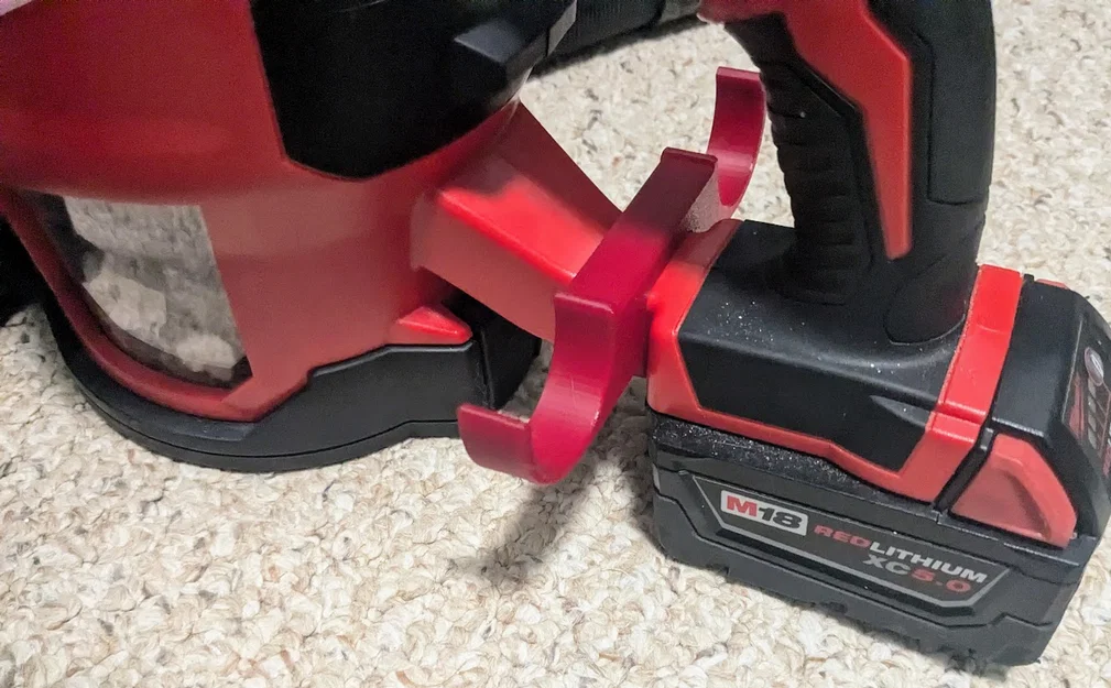 Kẹp giữ ống hút máy hút bụi cầm tay Milwaukee M18 (File in 3D) - Image 1