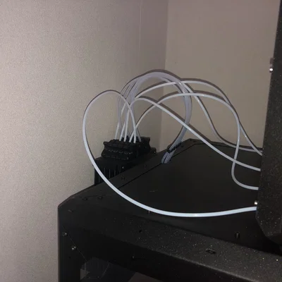 Ngàm gắn enclosure cho MMU3 buffer (MMU3 buffer enclosure mount)