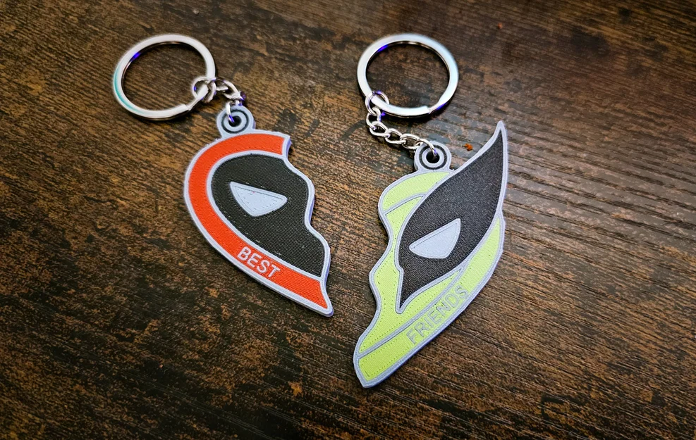 Móc khóa cặp đôi Deadpool & Wolverine (trái tim ghép) | DEADPOOL AND WOLVERINE LLAVERO PARA PAREJAS - Image 1