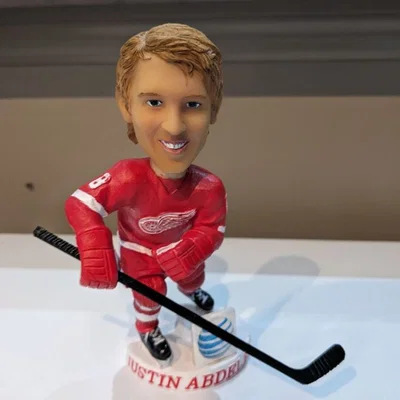 Gậy khúc côn cầu thay thế cho mô hình Bobblehead (Justin Abdelkader)