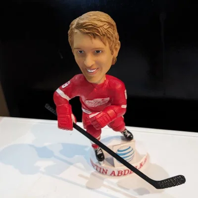 Gậy khúc côn cầu thay thế cho mô hình Bobblehead (Justin Abdelkader)