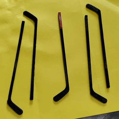 Gậy khúc côn cầu thay thế cho mô hình Bobblehead (Justin Abdelkader)