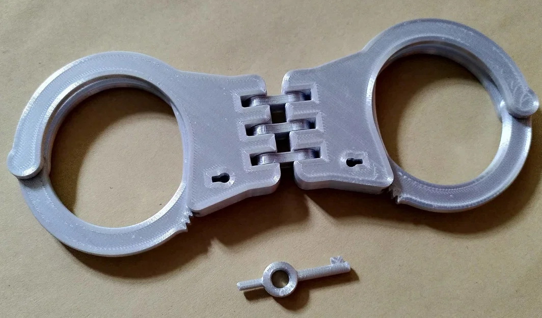 Còng tay 3 khớp (Triple hinge handcuffs) - Image 1