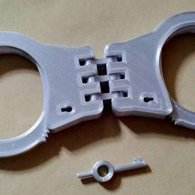 Còng tay 3 khớp (Triple hinge handcuffs)