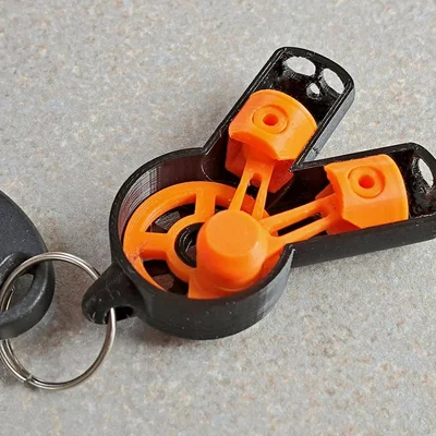 V-Engine KeyRing V2.0 – Móc khóa động cơ chữ V có piston chuyển động