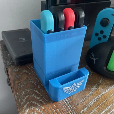 Kệ đỡ tay cầm Nintendo Switch và dây đeo Joy-Con