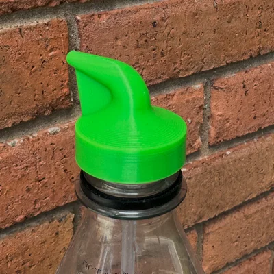 Nắp chai PET “Lab Bottle” – Bóp là phun (Squeeze-to-Squirt)