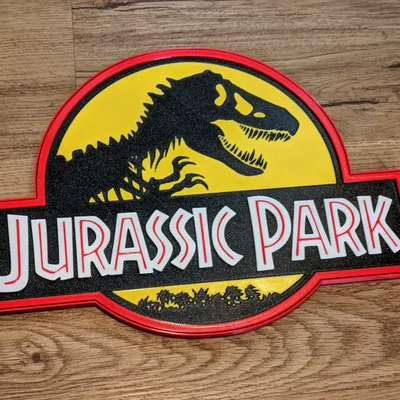 Logo Jurassic Park cho MMU/AMS