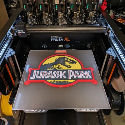 Logo Jurassic Park cho MMU/AMS