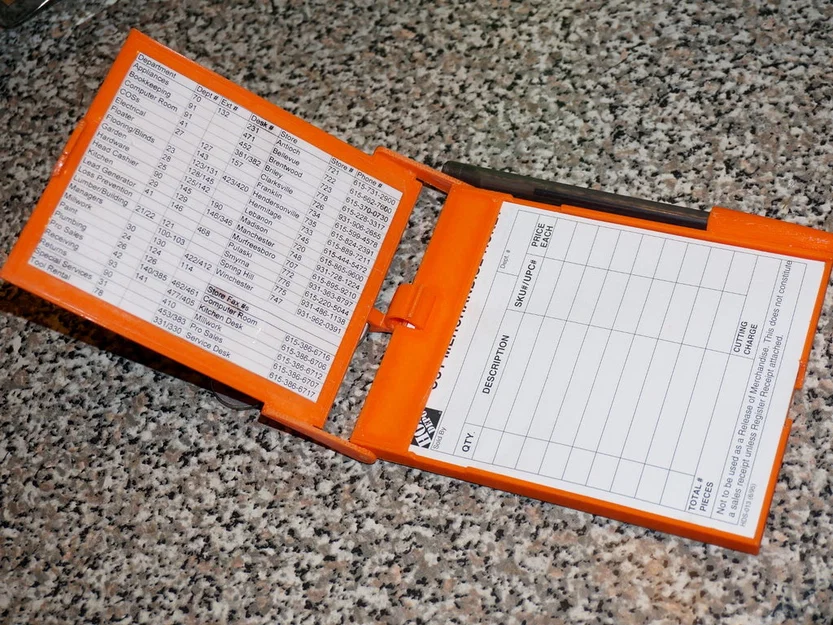 Giá đỡ sổ “Cut Ticket” Home Depot - Image 1
