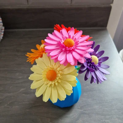 Bó hoa Gerbera nhiều màu kèm bình cắm