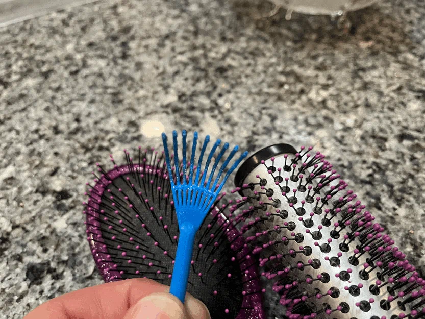 Dụng cụ cào làm sạch tóc trên lược (Hair Removal Rake) tiện lợi - Image 1