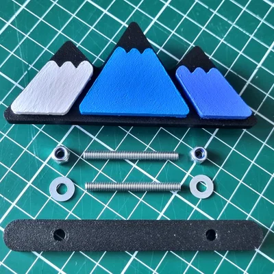 Huy hiệu lưới tản nhiệt Toyota hình núi (Toyota mountain grille badge)