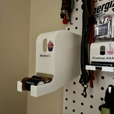 Khay nhả pin gắn pegboard (Pegboard battery dispensers)