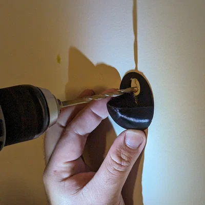 Dụng cụ hứng bụi khoan vách thạch cao (Drywall Dust Catcher)