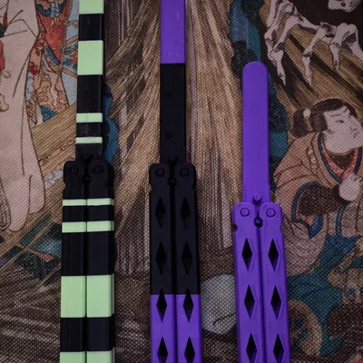 Tay cầm dài hơn + mặt trơn của Balisong Sanford Prime