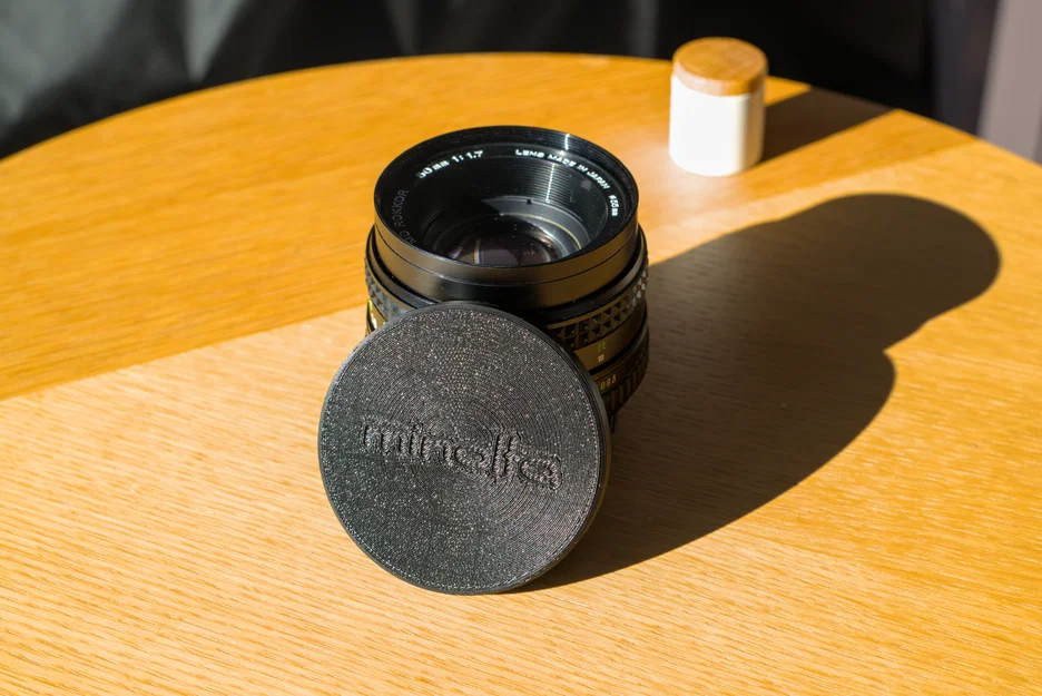 Nắp đậy trước Minolta MD Rokkor 50mm 1:1.7 – Ø55mm - Image 1