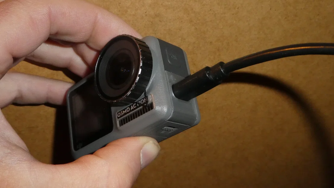 Nắp che USB/MicroSD chống mưa bụi cho DJI Osmo Action khi đạp xe - Image 1