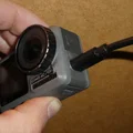 Nắp che USB/MicroSD chống mưa bụi cho DJI Osmo Action khi đạp xe - Thumbnail 1