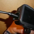 Nắp che USB/MicroSD chống mưa bụi cho DJI Osmo Action khi đạp xe - Thumbnail 3