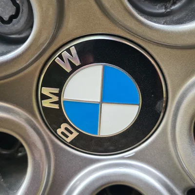 Nắp chụp tâm mâm 57mm (BMW + ...)