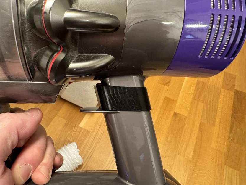 Bộ kẹp giữ cò súng và giá treo thông minh cho Dyson V10 - Image 1