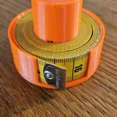 Dụng cụ cuộn thước dây may vá (Tape measure reel) – Nähen Massbandaufroller