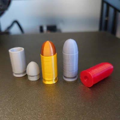 Replica đạn .45 ACP và snap cap (dummy round)