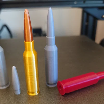 Replica 6.5mm Creedmoor và snap cap (dummy round)