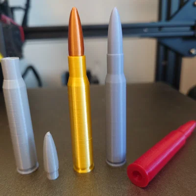 Replica .30-06 Springfield và snap cap (dummy round)