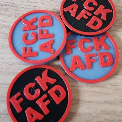 Xu 1€ cho xe đẩy mua sắm (Einkaufswagen Chip) – “FCK AFD”