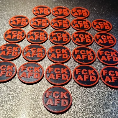 Xu 1€ cho xe đẩy mua sắm (Einkaufswagen Chip) – “FCK AFD”