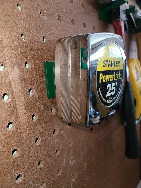 Giá treo thước cuộn trên bảng Pegboard thông minh - Image 1