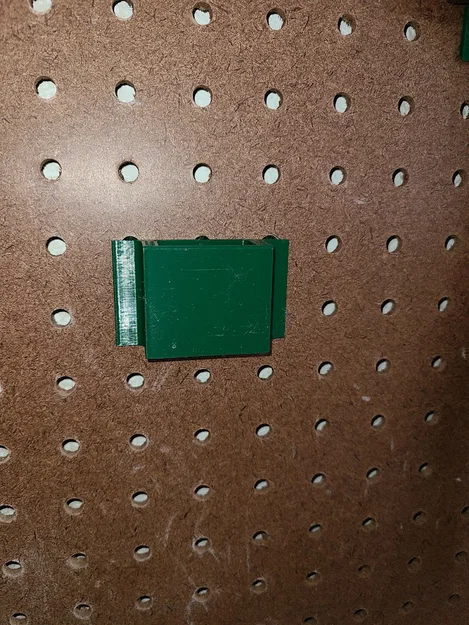 Giá treo thước cuộn trên bảng Pegboard thông minh - Image 2